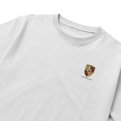 Black and white T-shirts featuring the Porsche crest on the front and a detailed 911 GT3 RS car illustration on the back, with performance specs and German flag design.