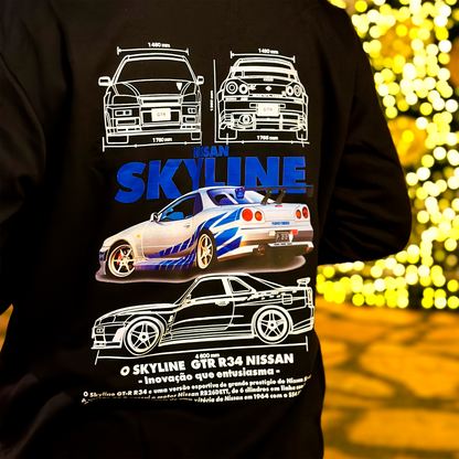 Black and white hoodies featuring the Nissan Skyline GT-R R34 blueprint design with technical views of the car and bold blue “SKYLINE” typography.